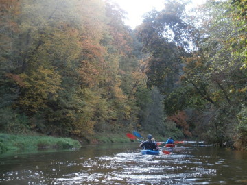 Kayaking down the river Sirvinta