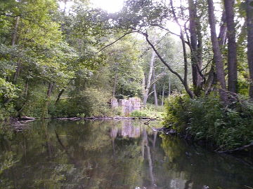 The river Merkys. Remains of the dam at 81.9 km